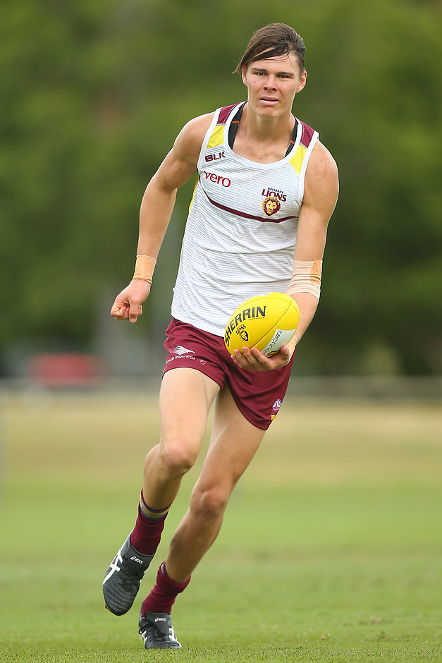 AFL 2016 Training - Brisbane 190216 BRISBANE, AUSTRALIA - FEBRUARY 19: Eric Hipwood handballs during a Brisbane Lions AFL training session at Giffin Park on February 19, 2016 in Brisbane, Australia. (Photo by Chris Hyde/Getty Images/AFL Media)